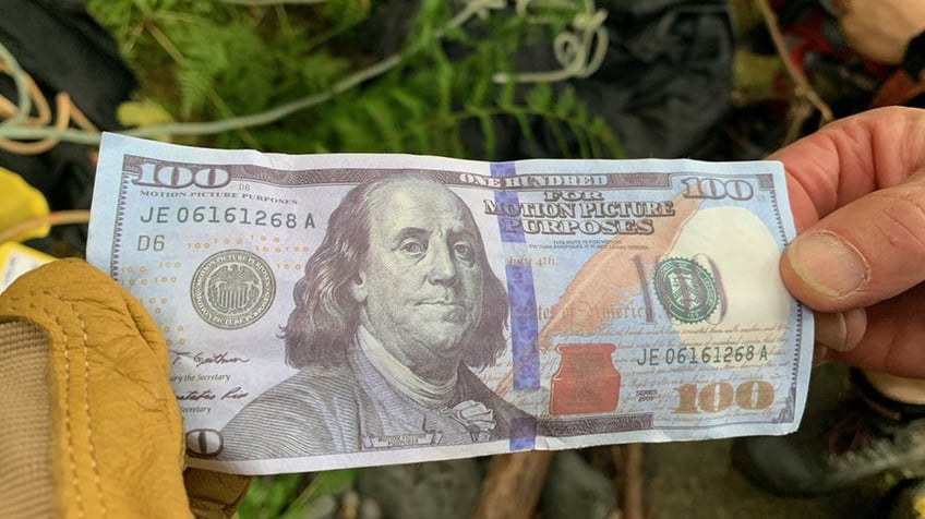 oregon sheriff warns of fake 100 bills tossed over multnomah falls after hikers reportedly risk their lives