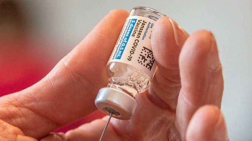 Athens City-County Health Department Director of Nursing, Crystal Jones, 52, loads syringes with the vaccine on the first day of the Johnson and Johnson vaccine being made available to residents. Recently, a federal judge rejected a bid to stop Oregon's COVID-19 vaccine mandate.