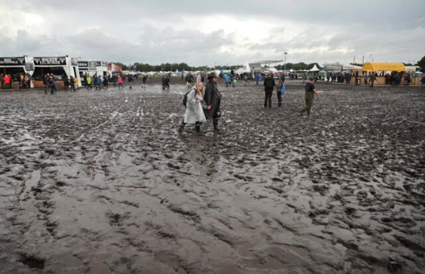 organizers of heavy metal festival in germany ask visitors to leave cars at home due to bad weather