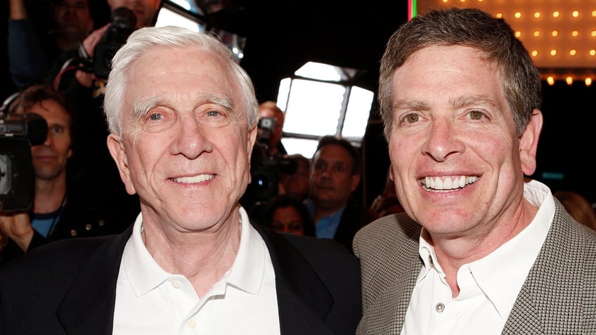 Close up of Leslie Nielsen and David Zucker