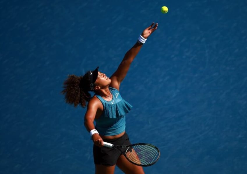 Japan's Naomi Osaka serves in her victory over Ons Jabeur of Tunisia at the WTA Toronto Ma