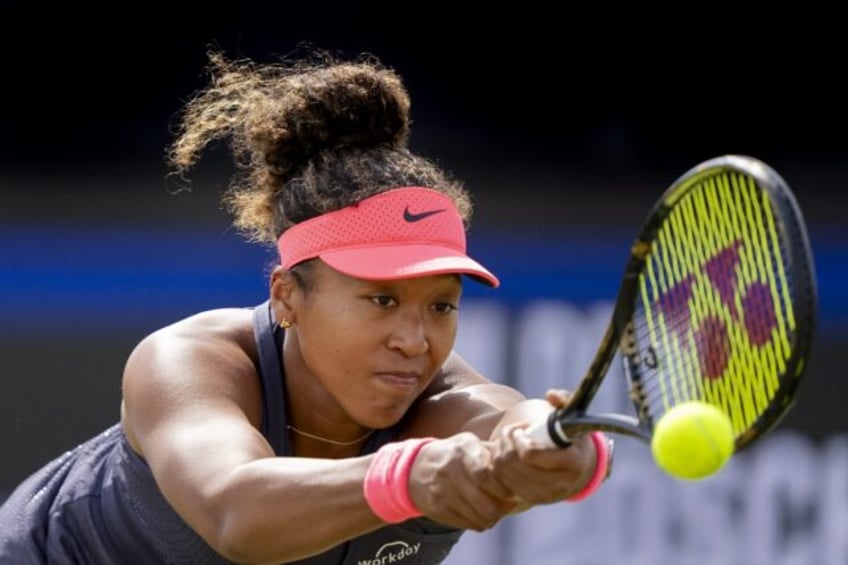 Naomi Osaka lit the cauldron at the opening ceremony of the Covid-delayed Tokyo Olympics i