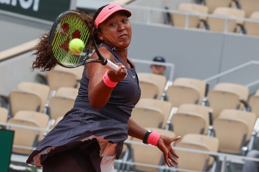 Power-packed: Naomi Osaka plays a forehand to Lucia Bronzetti