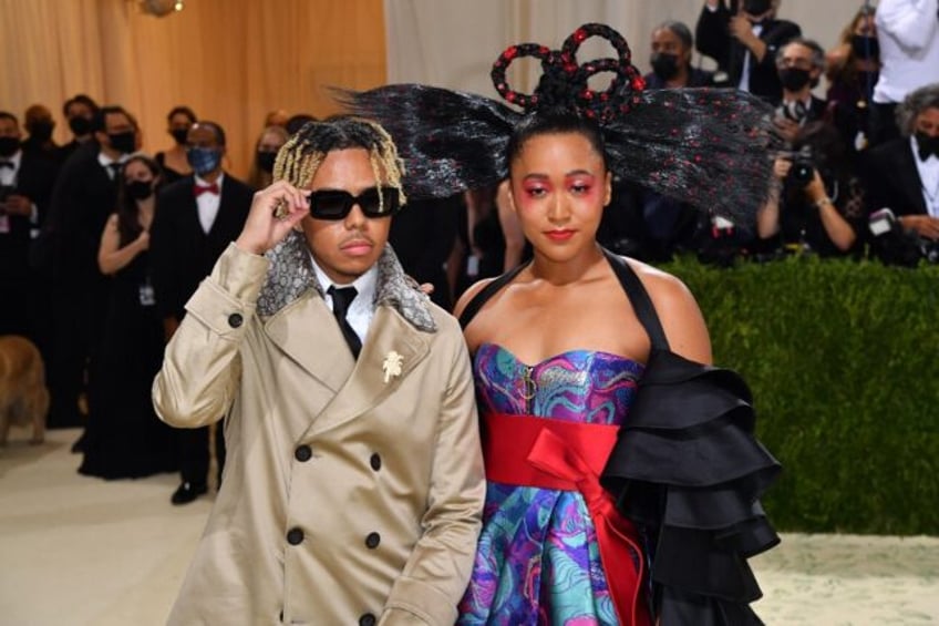 Japanese tennis star Naomi Osaka, right, and US rap singer Cordae have reportedly become n