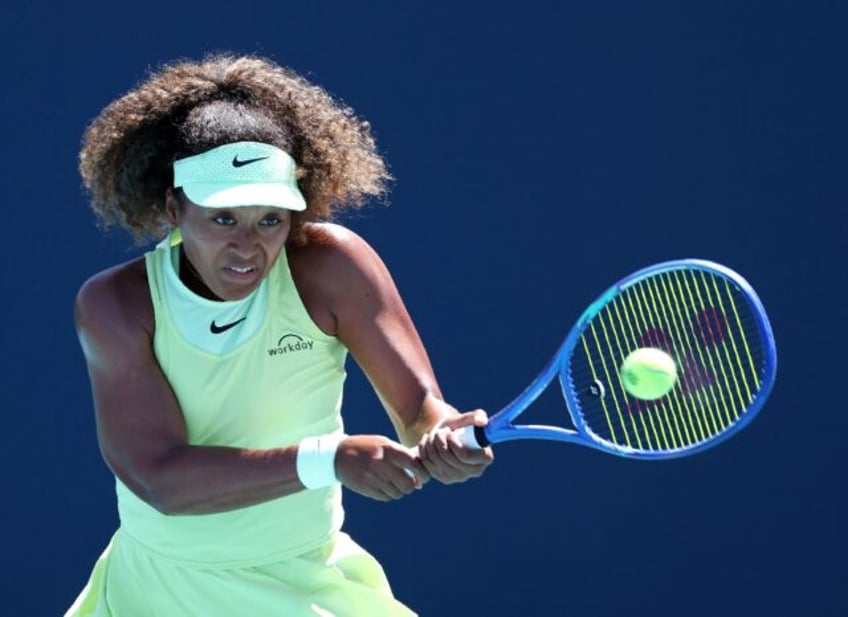 Japan's Naomi Osaka fires a backhand in her first-round win over Ukrainian qualifier Yulii