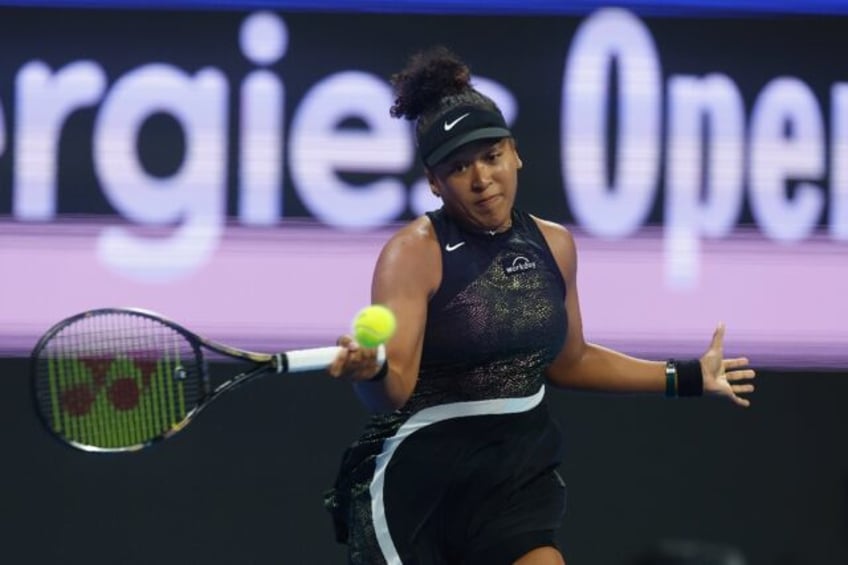 Returned with interest: Naomi Osaka in action against Karolina Pliskova