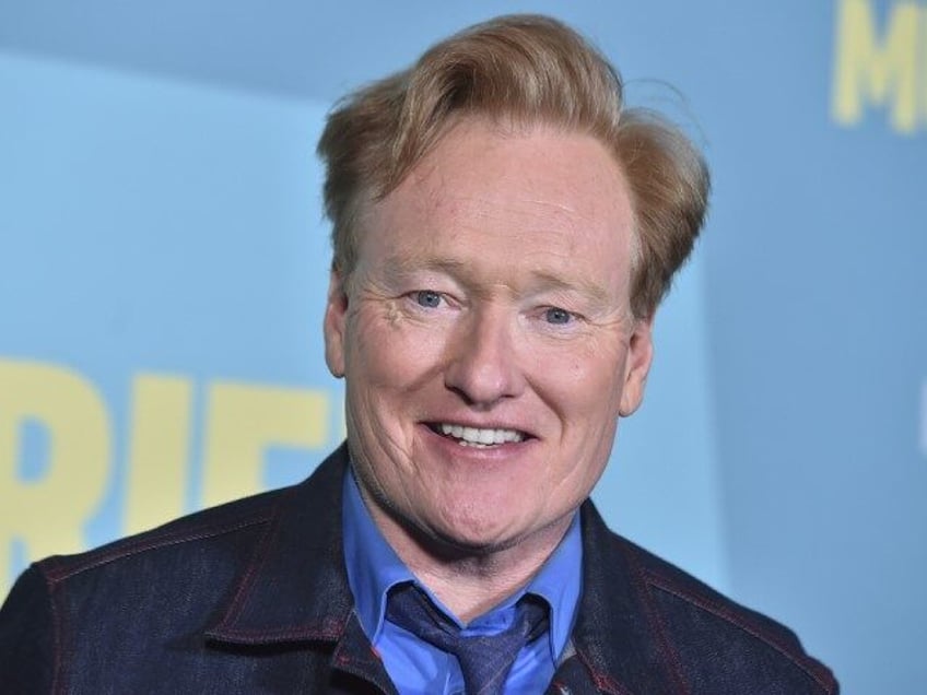 Conan O'Brien arrives at a photo call for "Conan O'Brien Must Go" on Tuesday, April 16, 20