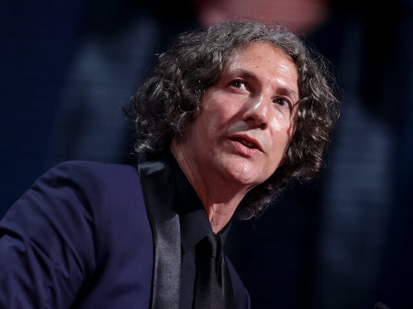 CANNES, FRANCE - MAY 27: Jonathan Glazer (L) receives The Grand Prix Award for 'The Z