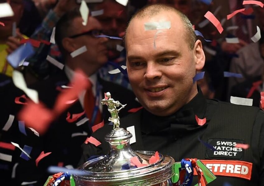 Glory days: Stuart Bingham with the trophy after winning the 2015 world championships