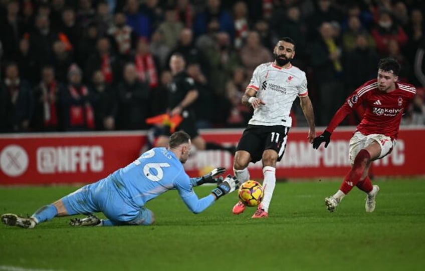 Nottingham Forest keeper Matz Sels saves from Liverpool's Mohamed Salah