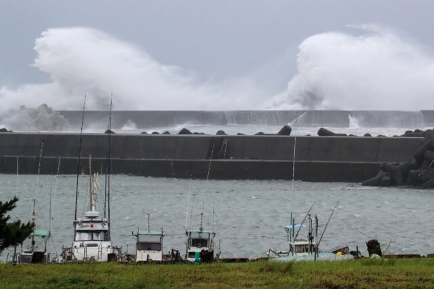 over 180000 residents urged to seek shelter as tropical storm soaks japan