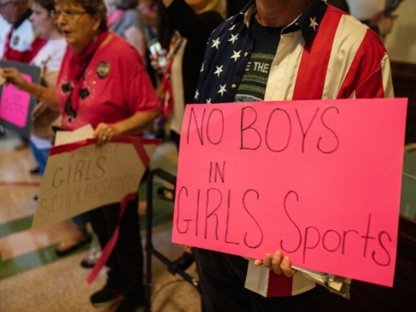 AUSTIN, TX - SEPTEMBER 20: Demonstrators supporting restrictions on transgender student at