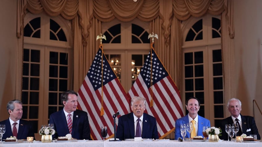 President-elect Donald Trump speaks during a meeting with Republican governors at Mar-a-Lago,  on Thursday, Jan. 9, 2025, in Palm Beach, Fla., as Georgia Gov. Brian Kemp, Virginia Gov. Glenn Youngkin, Lousiana Gov. Jeff Landry, and South Carolina Gov. Henry McMaster listen. (AP Photo/Evan Vucci)