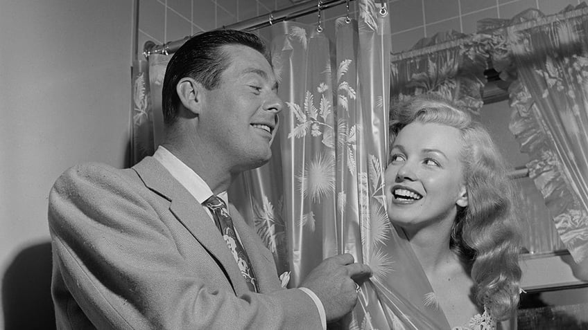 Don DeFore teasing Marilyn Monroe.