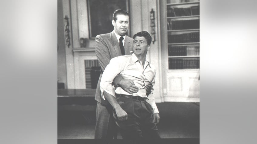 Don DeFore holding on to Ronald Reagan