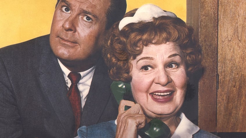 Don DeFore making a funny face next to the character Hazel holding the phone.