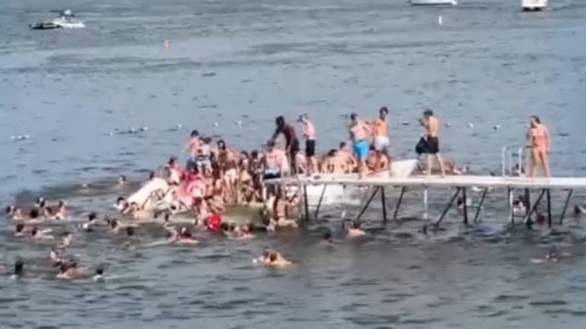 packed pier at university of wisconsin madison collapses causing injuries way too many kids