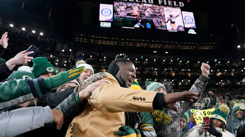 LeRoy Butler is embraced by fans