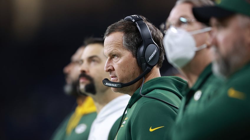 Joe Barry stands on the sideline