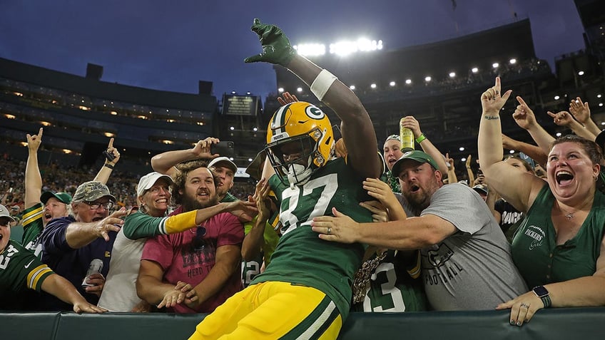 Romeo Doubs of the Packers after scoring a preseason touchdown