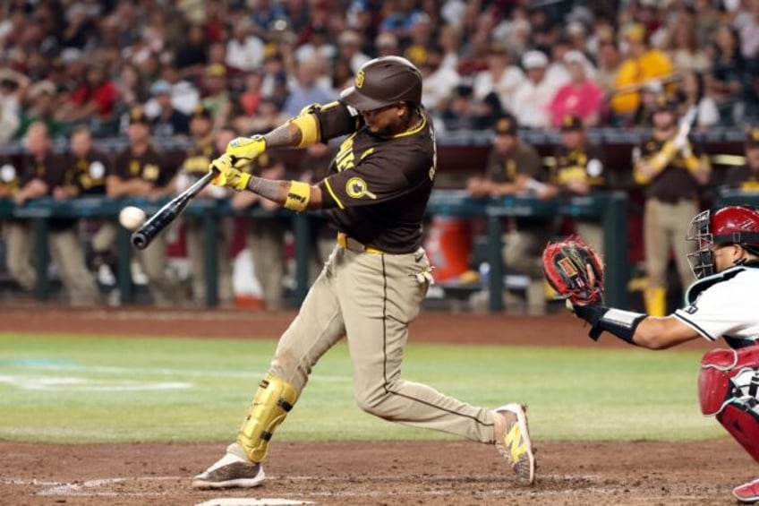 Luis Arraez of the San Diego Padres hits a double in the sixth inning of against the Arizo