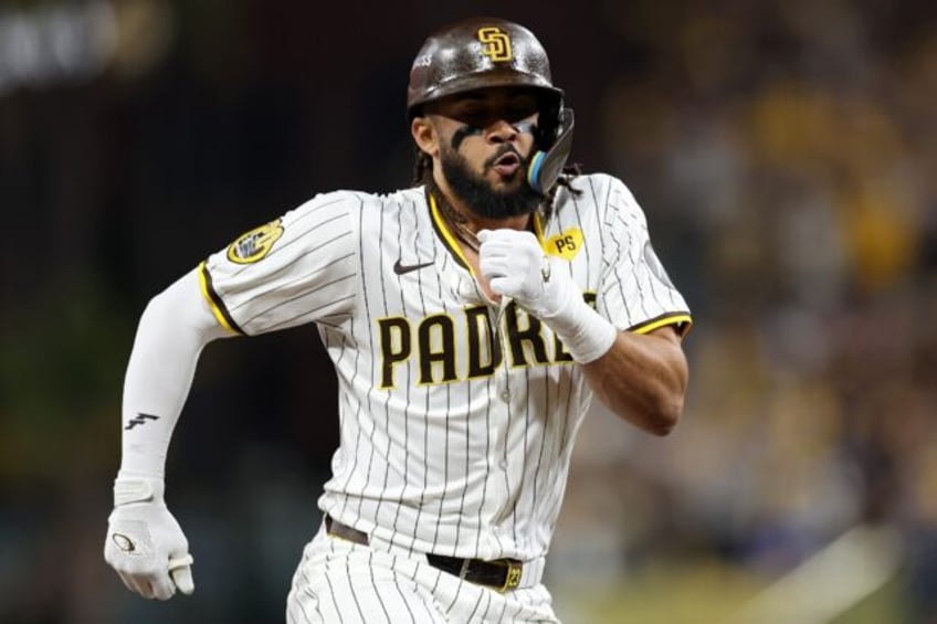 Fernando Tatis Jr. rounds the bases after his decisive two-run home run helped the San Die