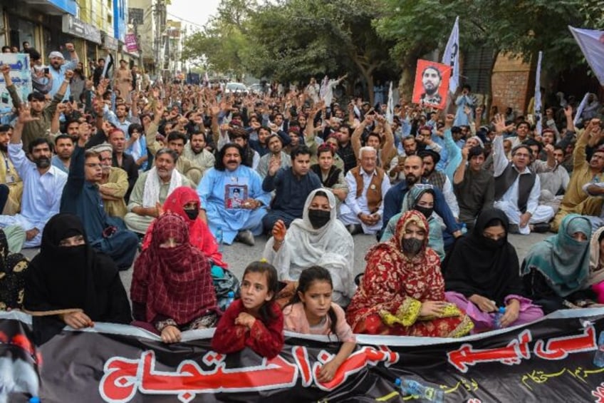 Supporters and activists of Pashtun Tahafuz Movement (PTM) take part in a protest against