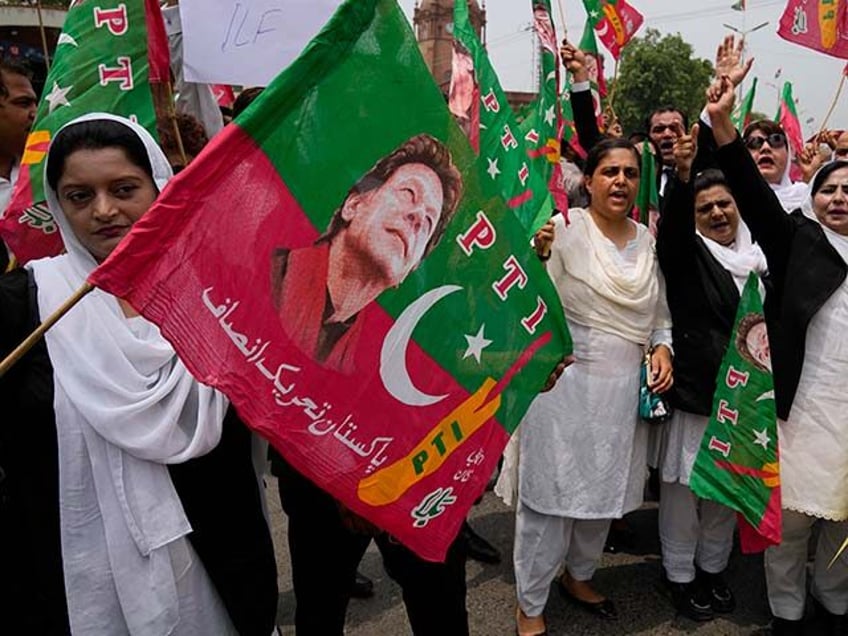 Lawyers, who support Pakistan's former Prime Minister Imran Khan, hold a protest against Khan's imprisonment, in Lahore, Pakistan, Monday, Aug. 7, 2023. Khan is now an inmate at a high-security prison after being convicted of corruption and sentenced to three years. (AP Photo/K.M. Chaudary)