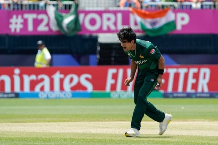 Pakistan's Naseem Shah celebrates taking his third wicket against India at the T20 World C