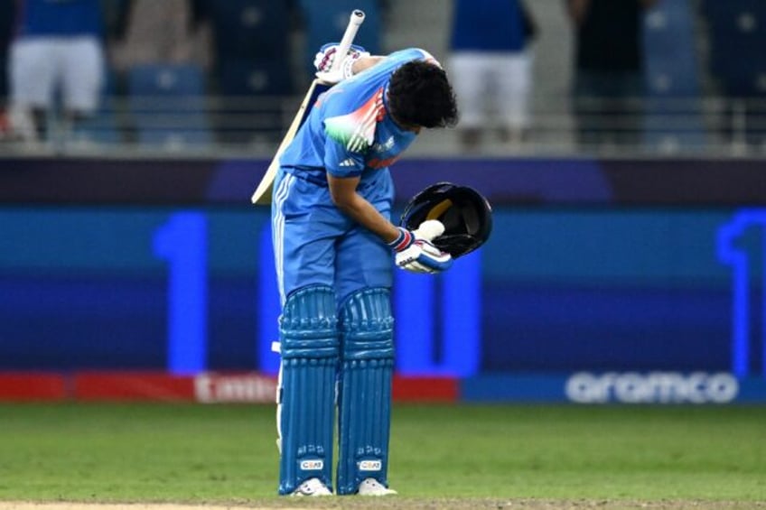 India's Shubman Gill celebrates after scoring a century