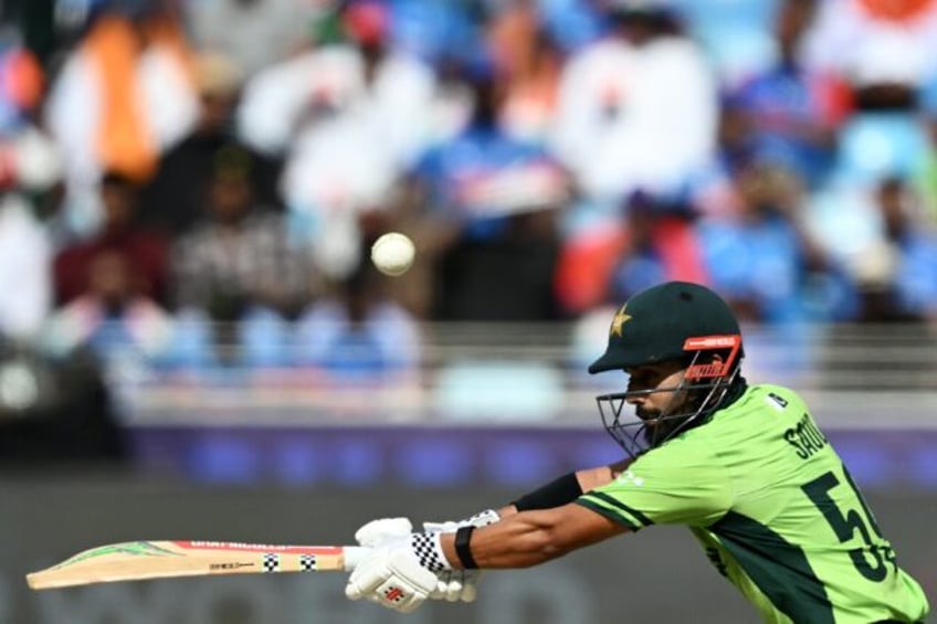 Pakistan's Saud Shakeel plays a shot against India in Dubai