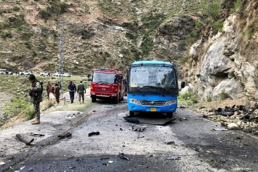 Chinese workers were targeted by a suicide bomber who rammed into their vehicle on a mount