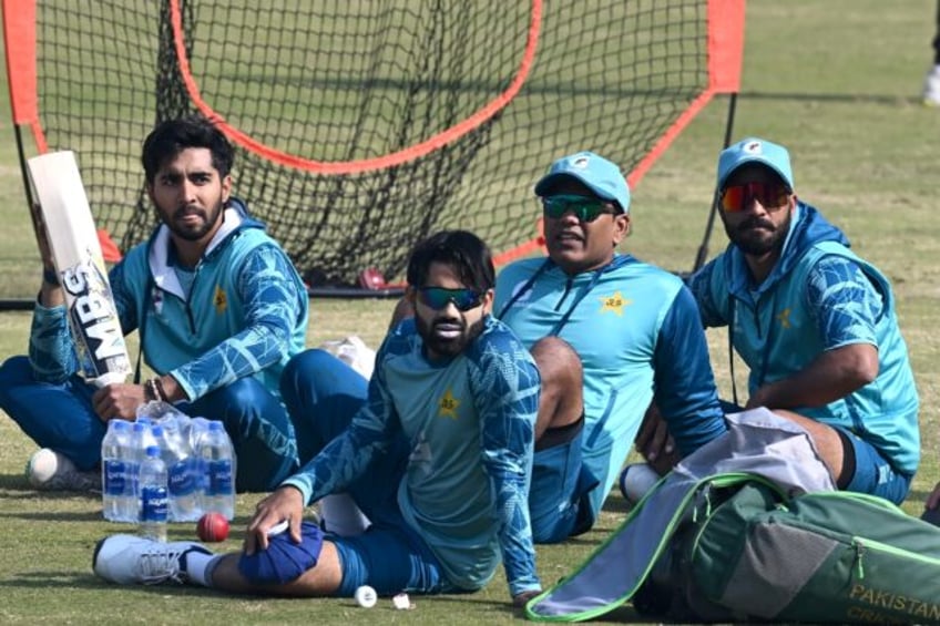 Pakistan players Sajid Khan (R), Noman Ali (2R) and Mohammad Rizwan (2L) attend a practice