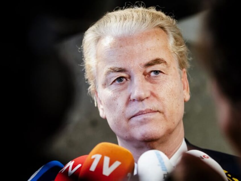 Geert Wilders (PVV) speaks to the press as he arrives for the debate on the final report o