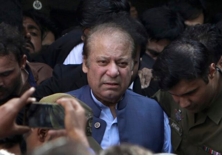 pakistans thrice elected self exiled former prime minister nawaz sharif returns home ahead of vote