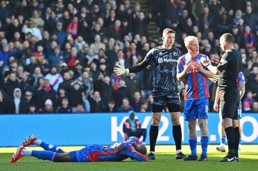 Jean-Philippe Mateta (left) was taken to hospital with a head injury