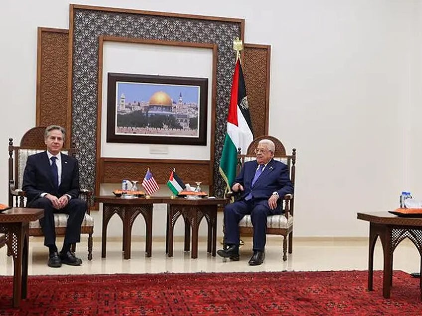 US Secretary of State Antony Blinken (L) meets with Palestinian president Mahmud Abbas (C) and prime minister Mohammad Shtayyeh (1st R), during his week-long trip aimed at calming tensions across the Middle East, in the Muqata'a, in Ramallah in the Israeli-occupied West Bank on January 10, 2024. (Photo by Jaafar …