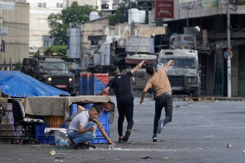 palestinian factions meet in egypt seeking reconciliation as violence surges in the west bank