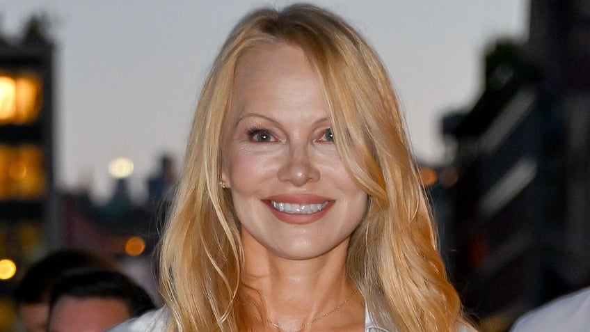 pamela anderson reveals why shes ditching her bombshell look selling iconic baywatch swimsuit