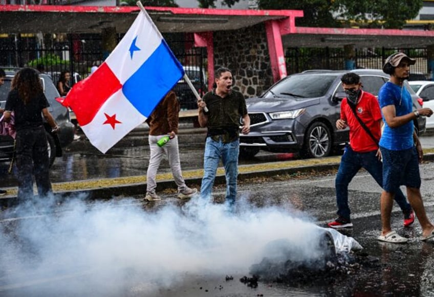 Panamanian demonstrators burned an effigy and photos of US President Donald Trump and his