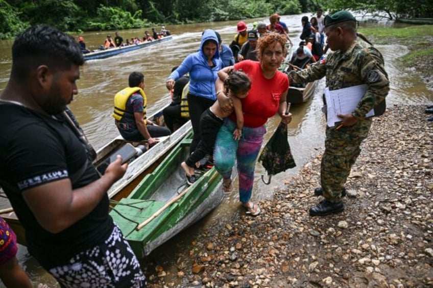 Migrants arrive at a reception center in the Darien region of Panama