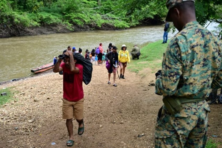 Migrants face inhospitable terrain, wild animals and criminal groups in the Darien jungle