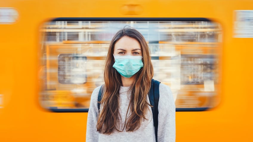 Woman mask subway