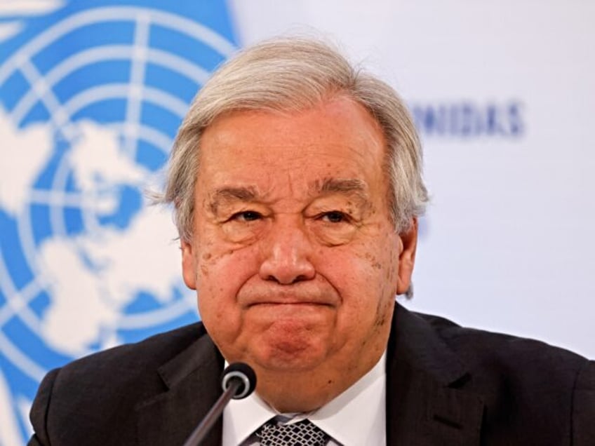 UN Secretary General Antonio Guterres reacts as he addresses the audience during a press c