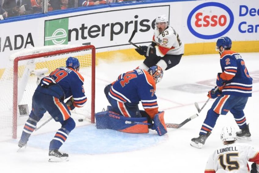 Brad Marchand of the Florida Panthers reacts after scoring the game-winning goal in the Pa