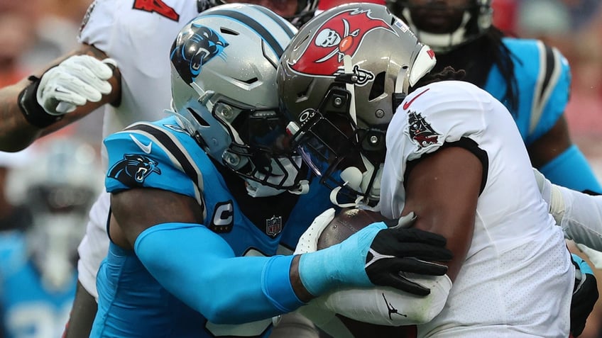 panthers brian burns ejected after taking swipe at bucs lineman explains incident