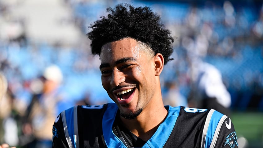 panthers bryce young gets first career win in battle of rookie quarterbacks against cj strouds texans