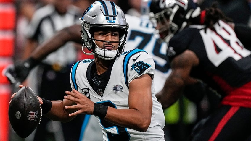 panthers bryce young throws first career td pass to hayden hurst tight end tosses ball into stands