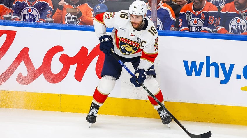 Aleksander Barkov looks to pass
