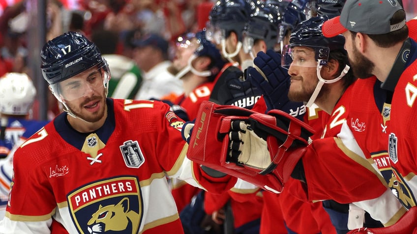 Evan Rodrigues celebrates with his teammates